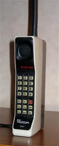 A Motorola DynaTAC 8000X from 1984. This phone has an early British Telecom badge and primitive red LED display