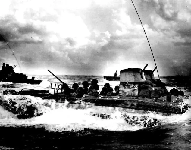 A U.S. amphibious tractor loaded with Marines approaches Tinian during the U.S. landings on that island