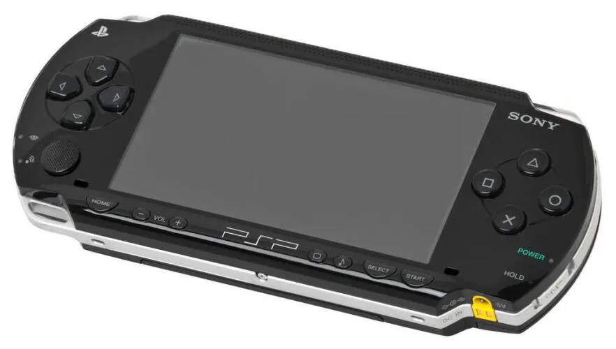 An original model PlayStation Portable (PSP-1000) handheld games console - image