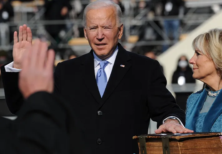 Biden taking the oath of office as president