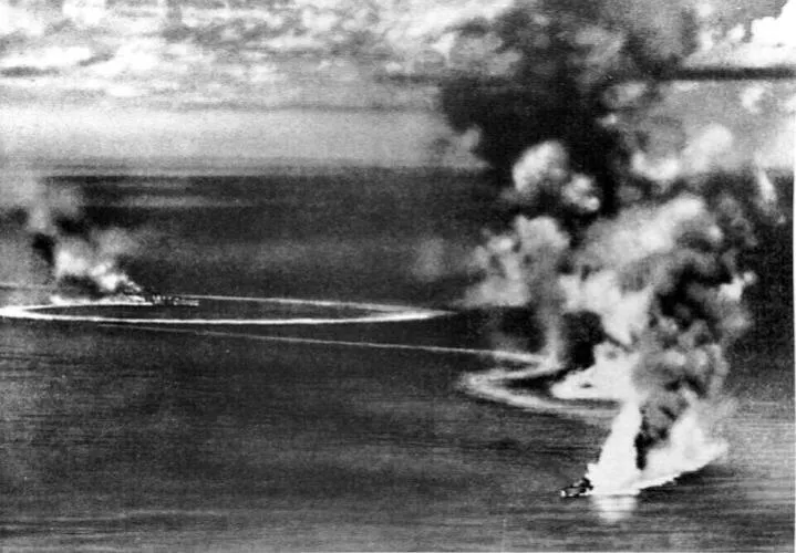 British heavy cruisers HMS Dorsetshire and Cornwall under Japanese air attack and heavily damaged - Indian Ocean raid
