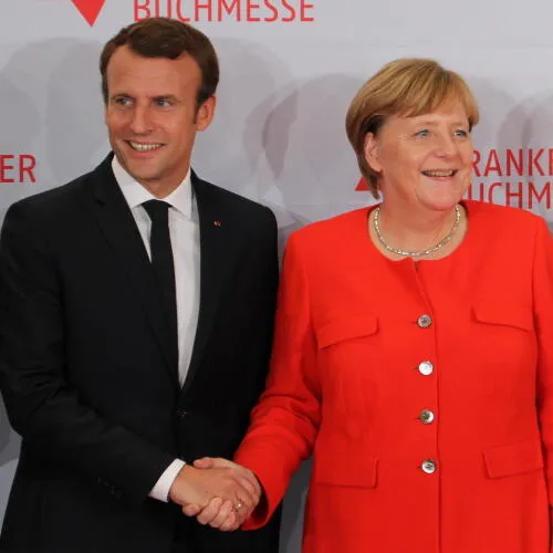 Emmanuel Macron and Angela Merkel image
