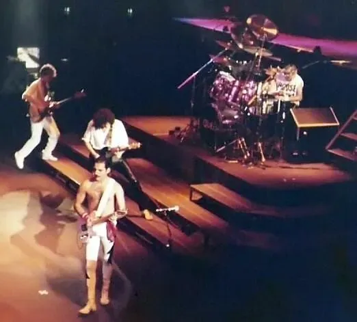 Mercury playing rhythm guitar during a Queen concert in Frankfurt, Germany, 1984