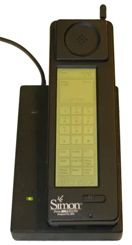 The IBM Simon Personal Communicator and charging base Date