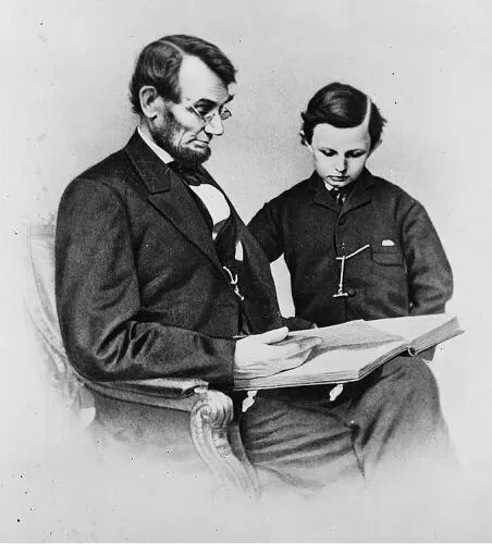 1864 photo of President Lincoln with youngest son, Tad