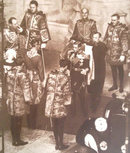 Edward VIII surrounded by heralds of the College of Arms prior to his only State Opening of Parliament, 3 November 1936