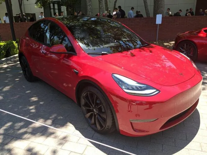 Tesla Model Y front passenger side view at the investor conference - image