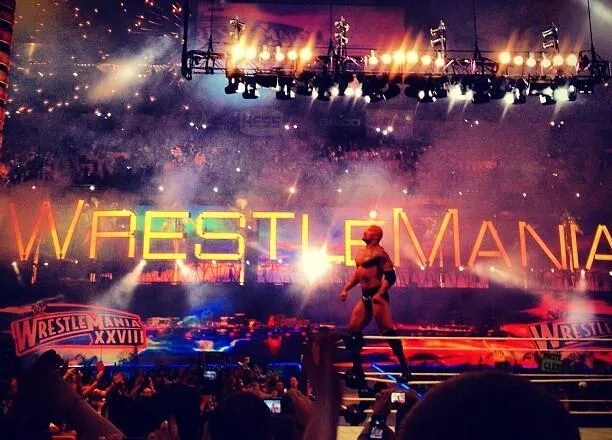 The Rock celebrating his victory at WrestleMania XXVIII