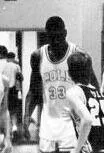 O'Neal playing for the Cole High School varsity basketball team in 1988–89.