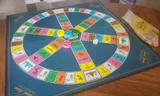 Board and pieces of Trivial Pursuit