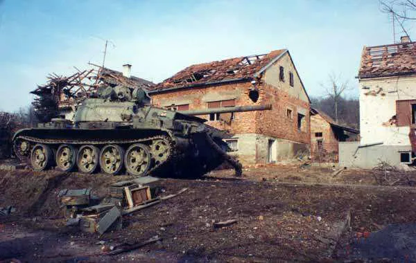Destroyed Yugoslav Army T-55 tank. This tank was hit by a Croatian AT missile, abandoned by its crew and later destroyed by another JNA tank