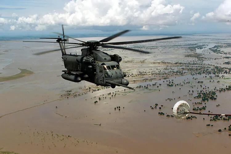 American helicopter flying over flooded Limpopo River in Mozambique 2000
