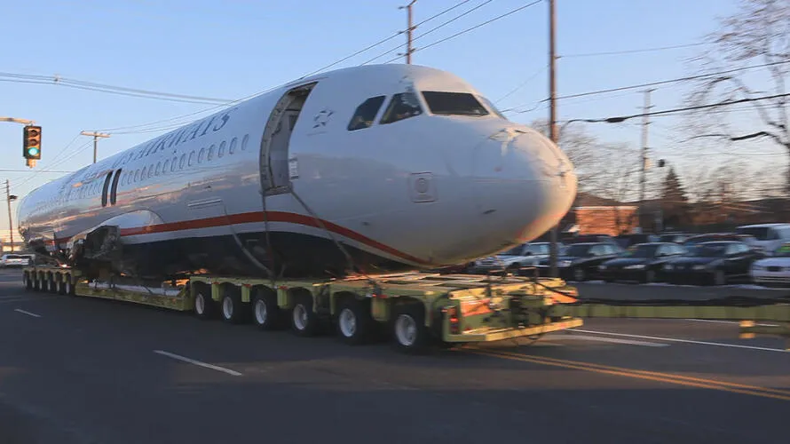 US Airways Flight 1549 being towed Image