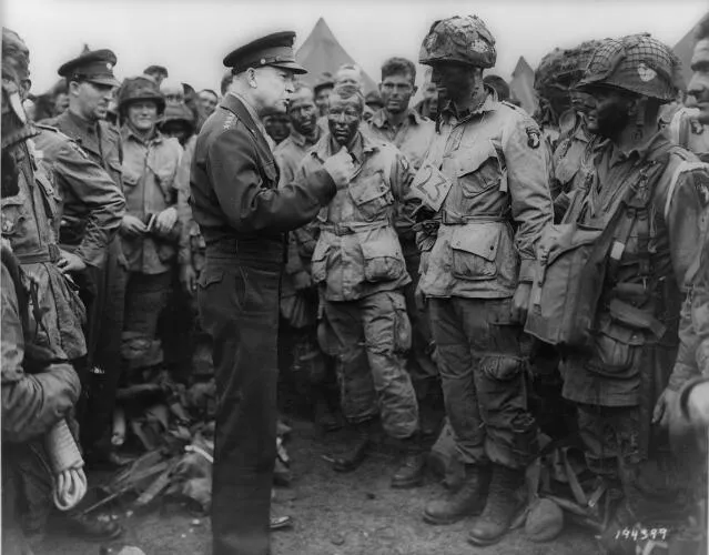 Eisenhower speaks with men of the 502nd Parachute Infantry Regiment, part of the 101st Airborne Division, on June 5, 1944, the day before the D-Day invasion